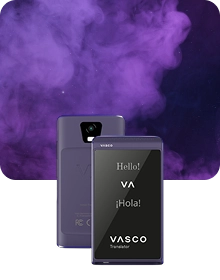 Two purple-tinted Vasco Translators Q1 shown from the front and back against a background of purple nebula clouds. The front screen displays 